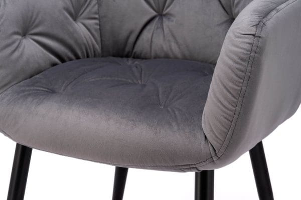 Grey velvet dining chair close up
