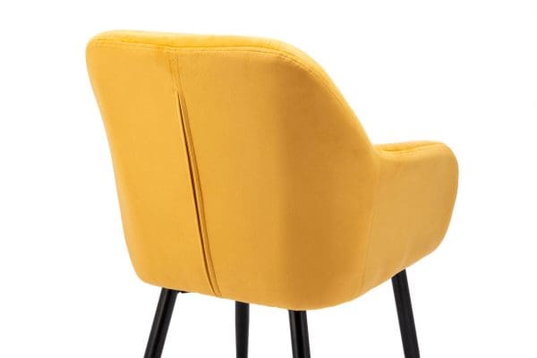 mustard velvet back of chair